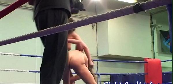 Busty lezzies wrestling in a boxing ring